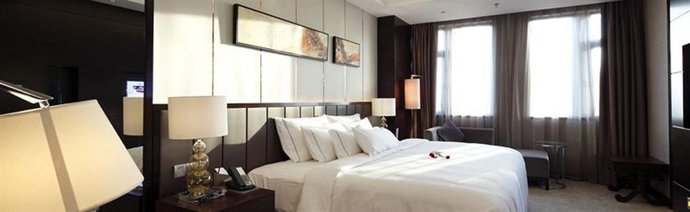 Riviera Hotel Ningbo Esterno foto